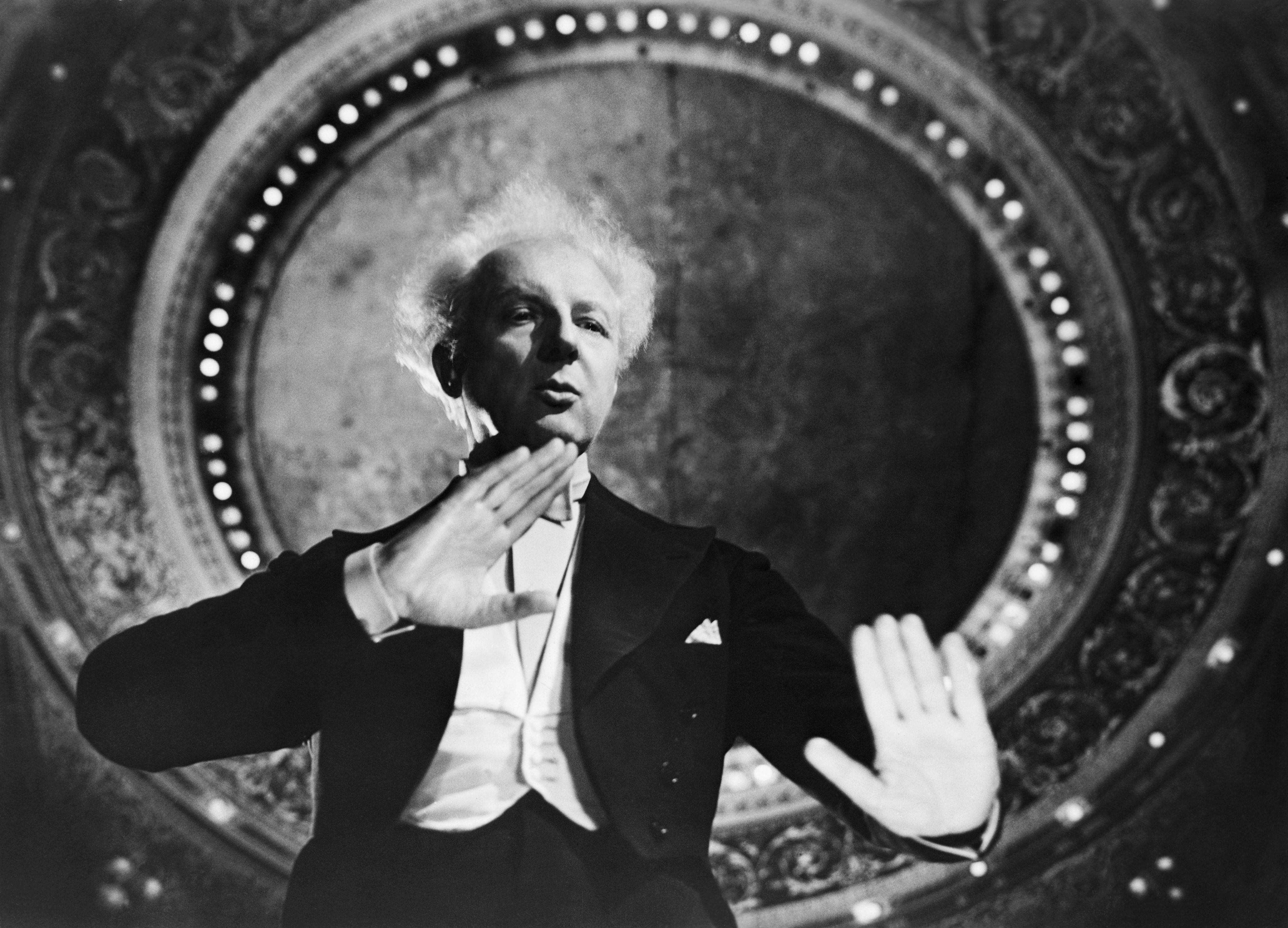 Conductor Leopold Stokowski Gesturing