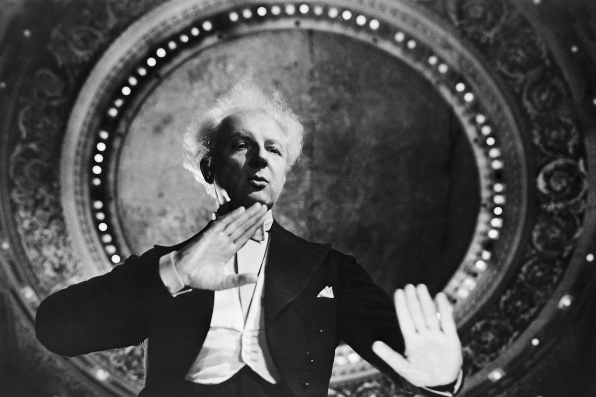 Conductor Leopold Stokowski Gesturing