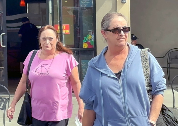 Elizabeth and Leslie Hackman are seen leaving a Denny's in Burbank Ca after their father's mysterious death