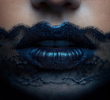 Elegant Black Lace Design on Lips Close-Up