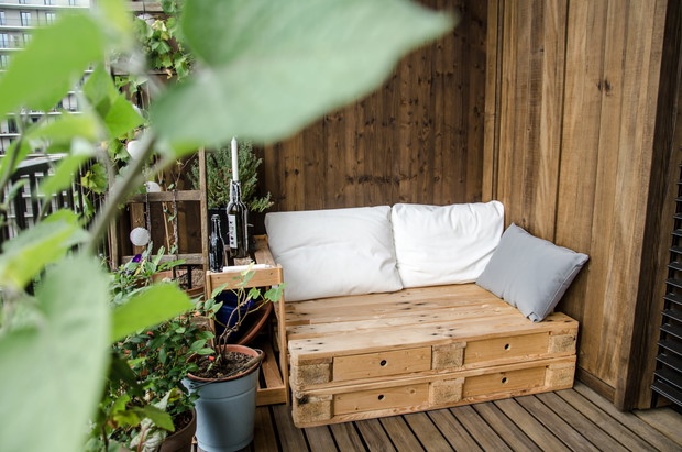 Wooden pallet couch on balcony