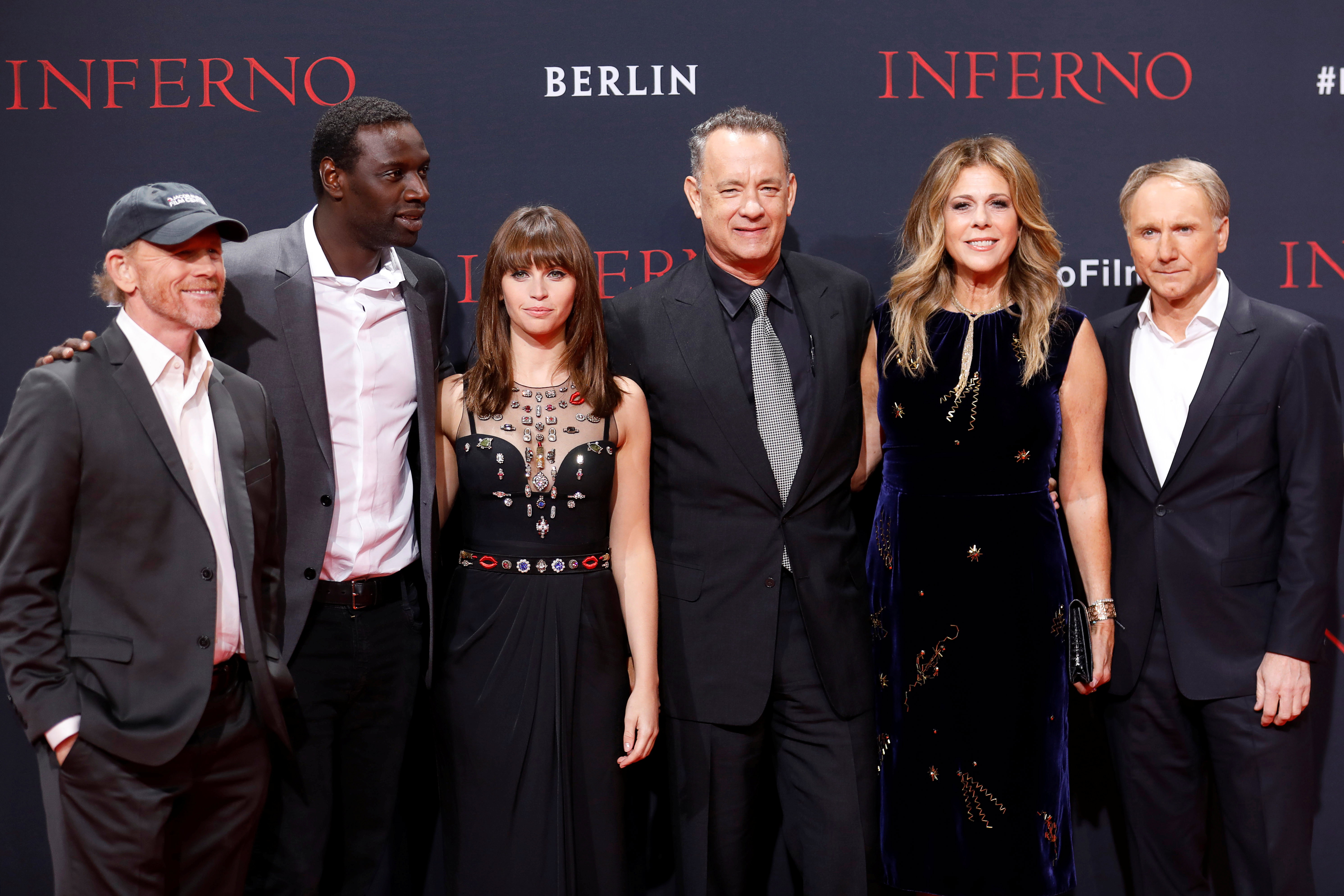 Director Ron Howard, actors Omar Sy, Felicity Jones, Tom Hanks, his wife Rita Wilson and author Dan Brown attend a screening of his film "Inferno" in Berlin