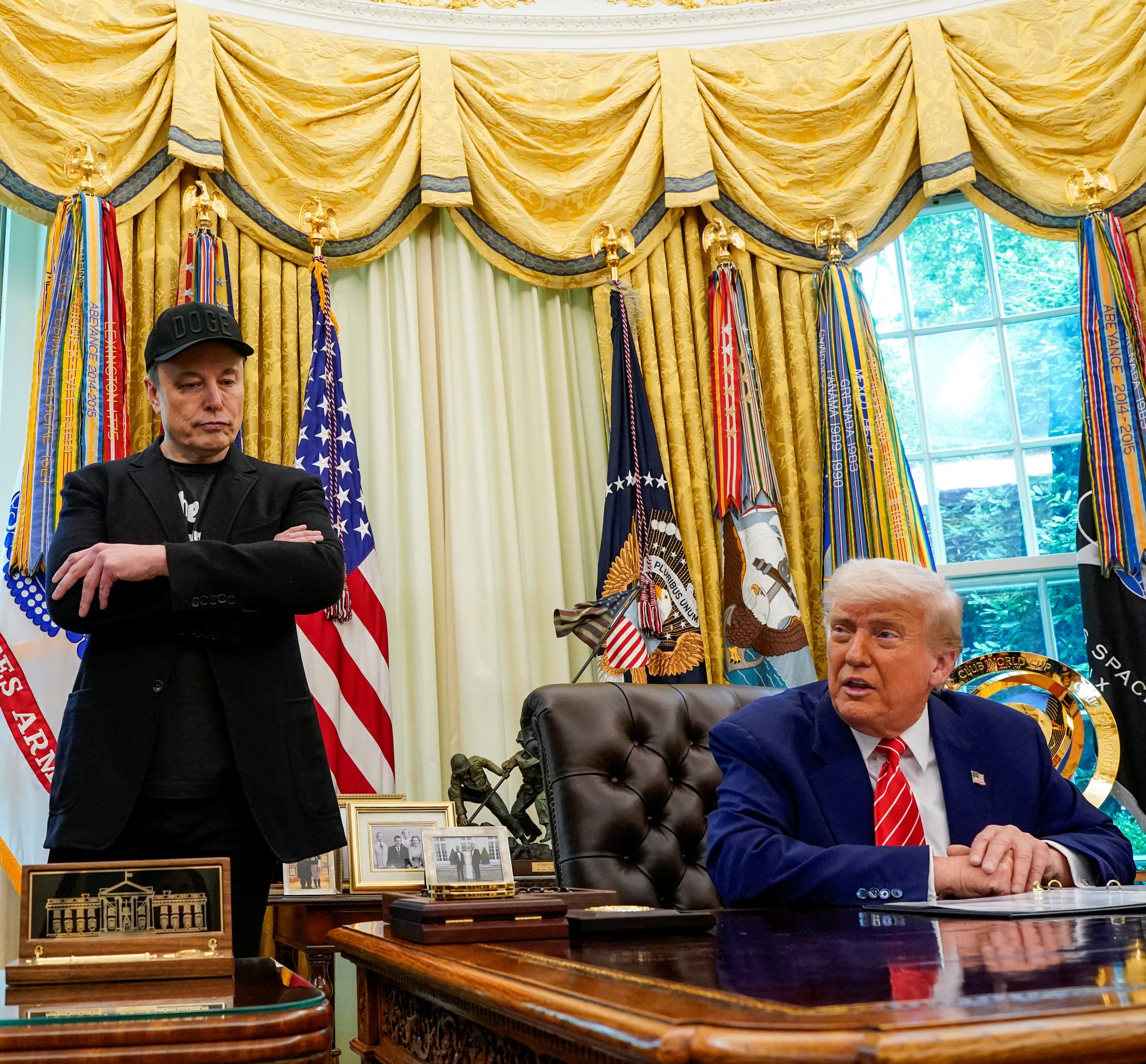 U.S. President Donald Trump and Elon Musk attend a press conference at the White House