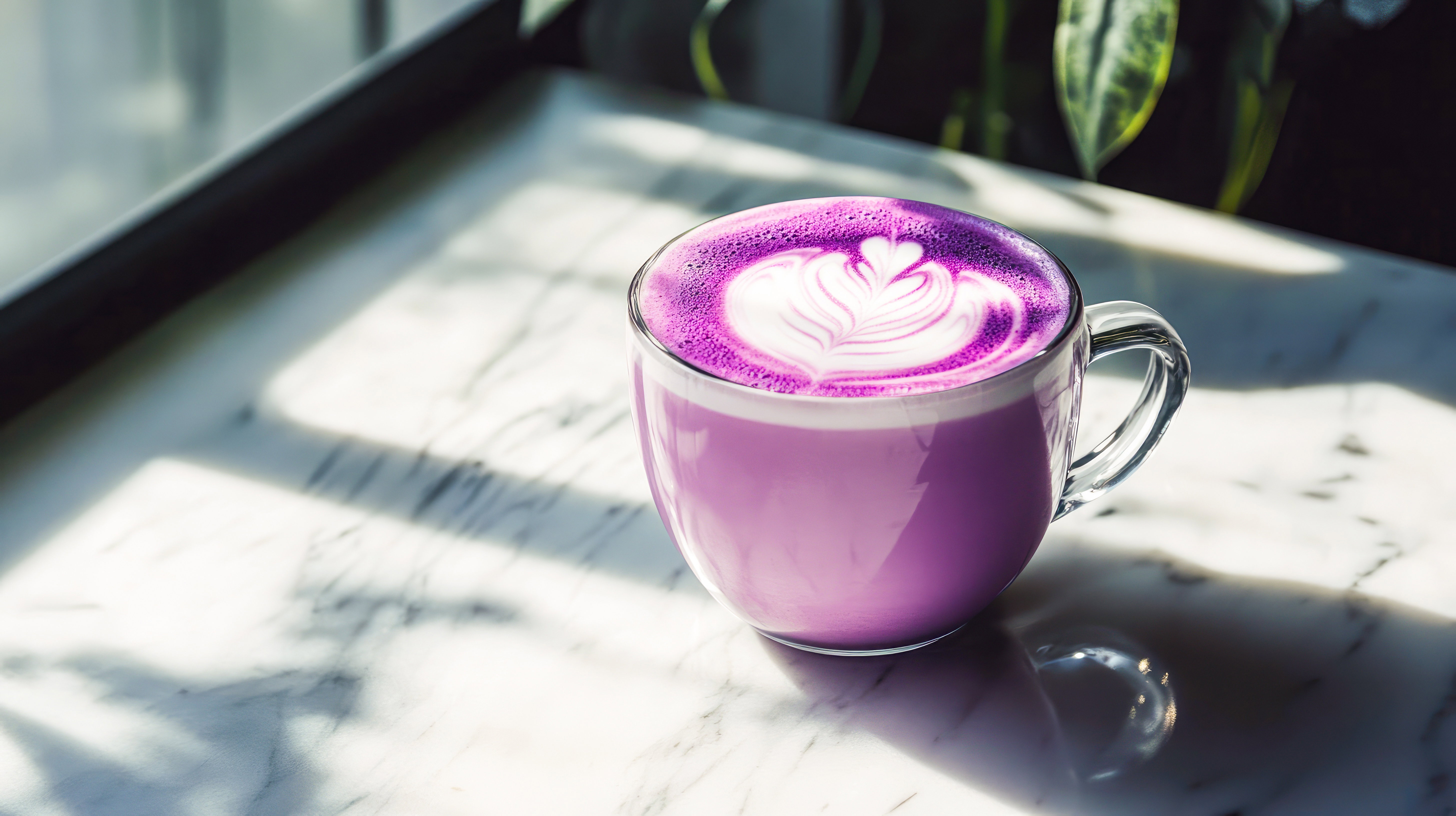 Trendy Purple Sweet Potato Latte With Milk Foam latte art. Purple sweet potato coffee in a cup on marble table with shadows. Trendy purple coffee recipe, cafe menu. Copy space