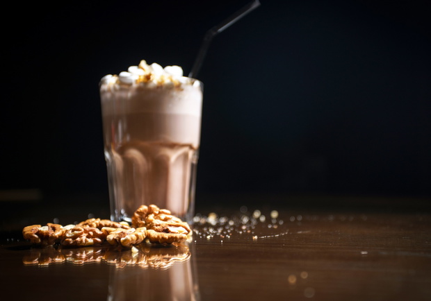 Coffee drinks on a black background. Coffee on a black table. Co