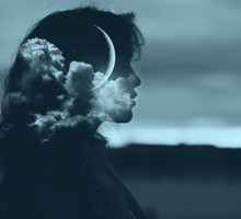 Beautiful woman profile silhouette portrait with moon in her head