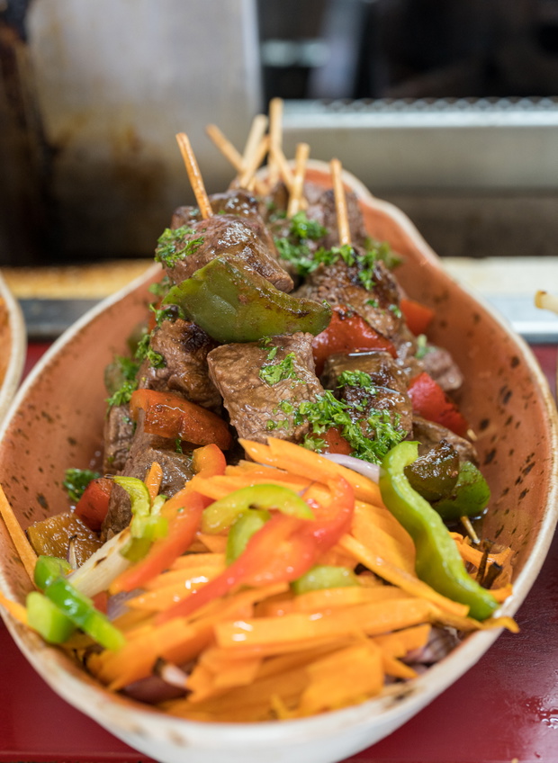 Tasty Beef Shish Kebab Garnished with Peppers and Served in a Bowl.
