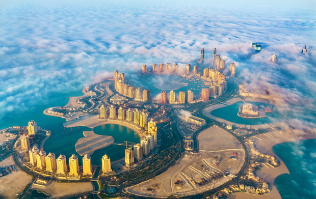 Aerial view of the Pearl-Qatar island in Doha through the morning fog - Qatar, the Persian Gulf