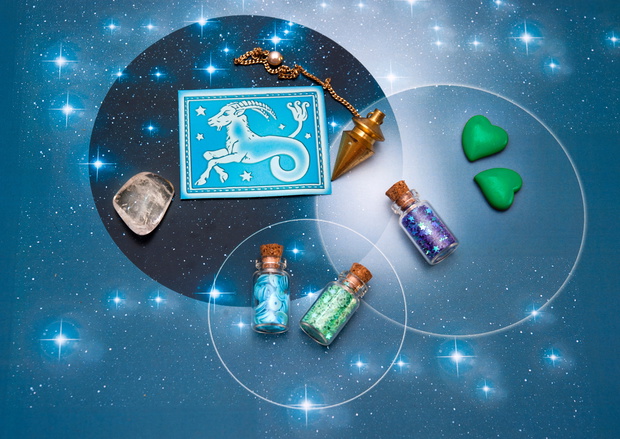 zodiac sign Capricorn  with magic bottles and hearts and with st