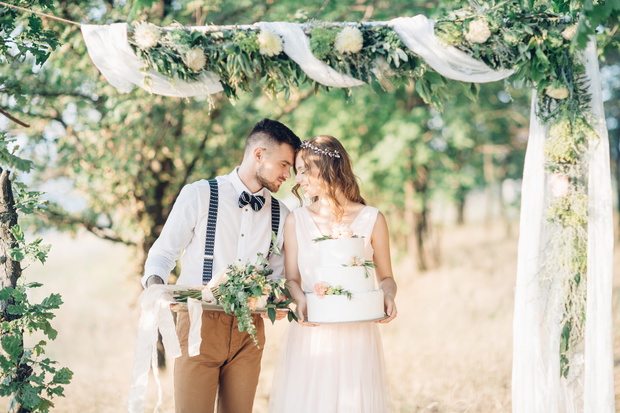 bride and groom hugging at the wedding in nature.