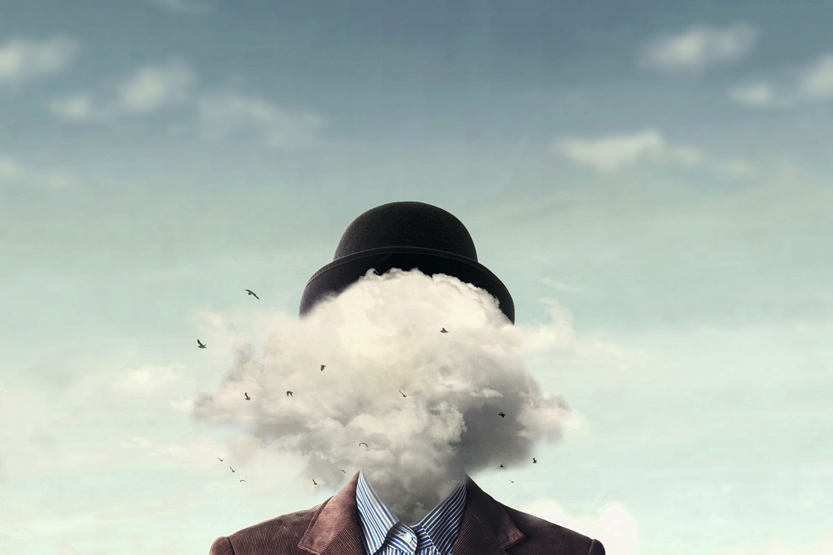 surreal concept head in the clouds