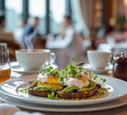 Elegant avocado toast with poached eggs and coffee served in a bright, modern restaurant.
