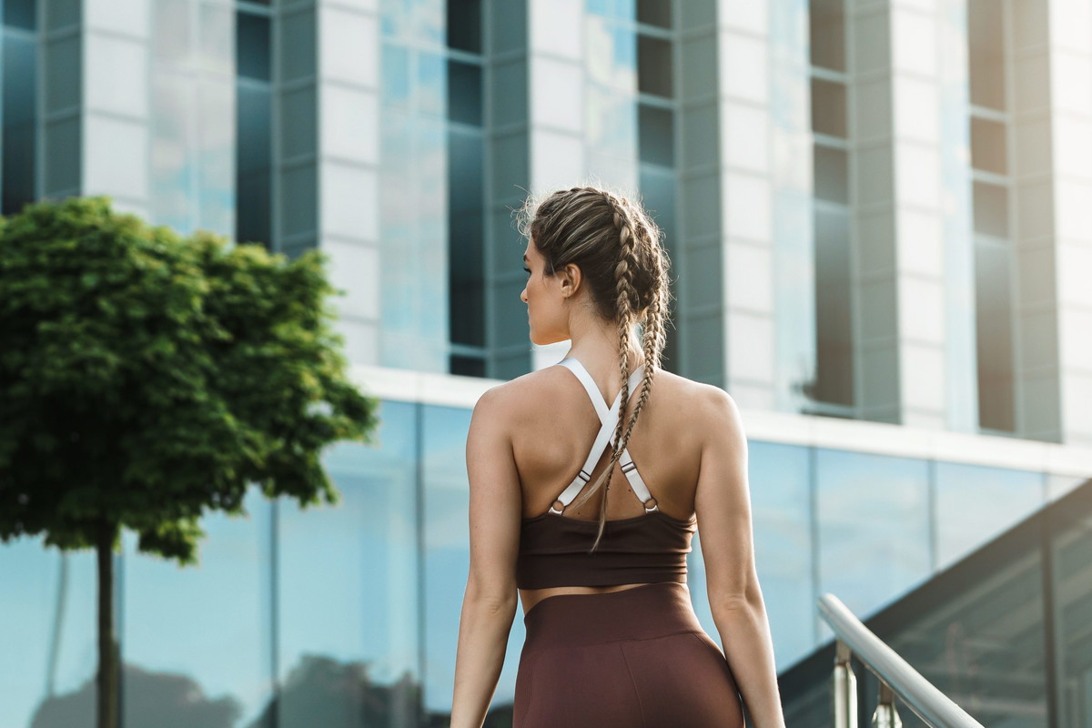 Sportive woman during her outdoor fitness workout