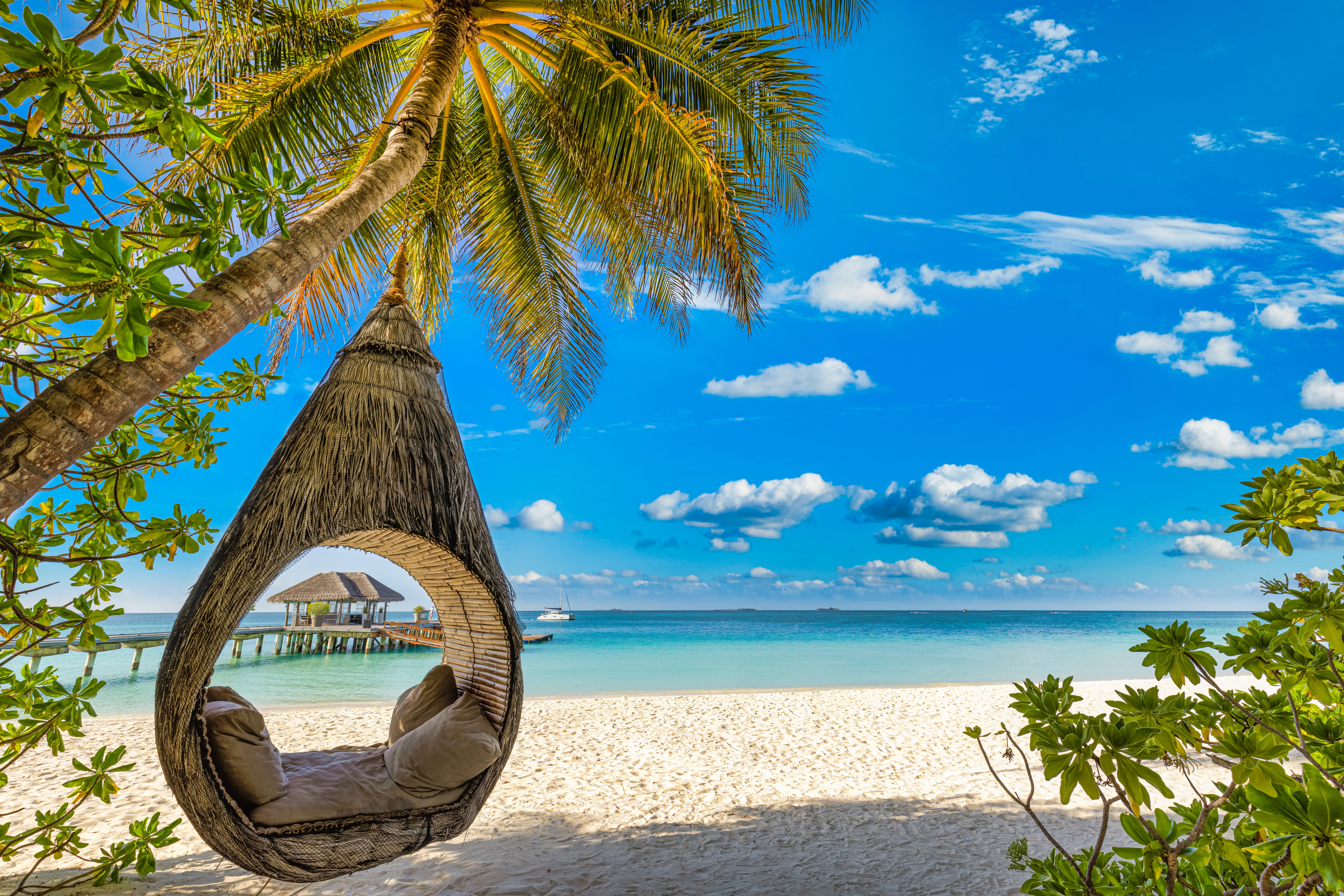 Tropical beach panorama as summer relax landscape with beach swi
