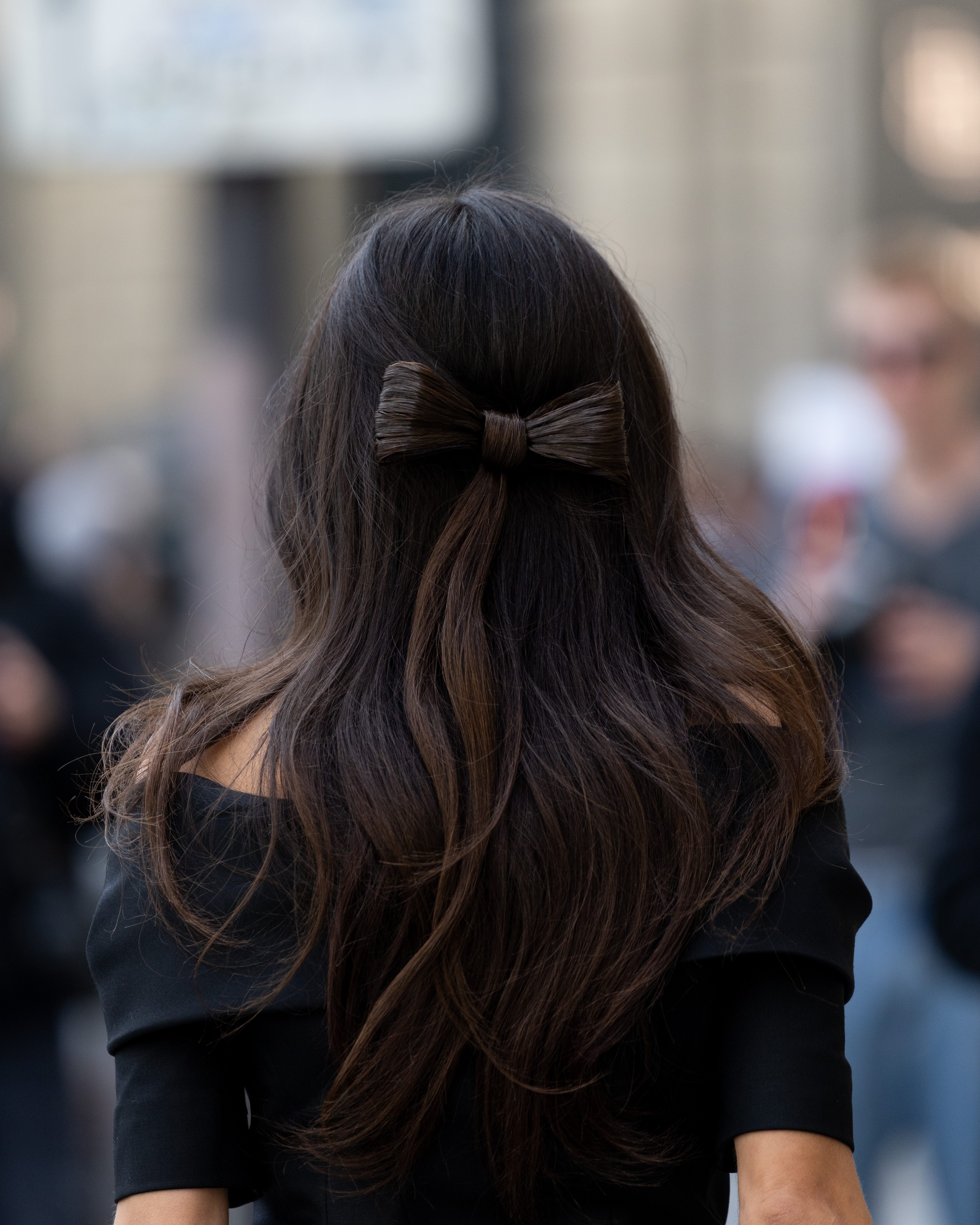 Street Style - Paris Fashion Week - Womenswear Fall/Winter 2025/2026 - Day Five