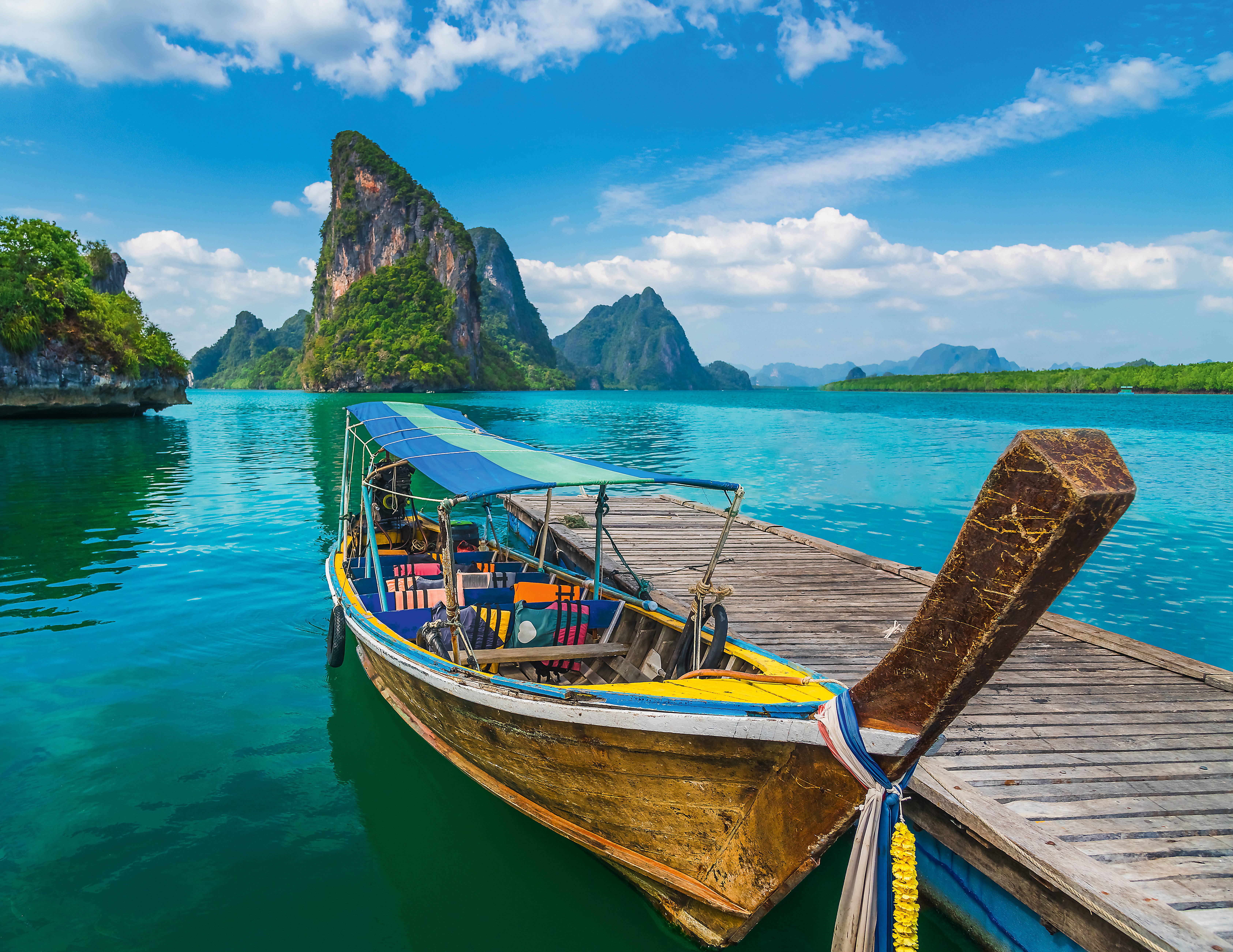 Beautiful nature scenic landscape Phang-Nga bay with wooden boat