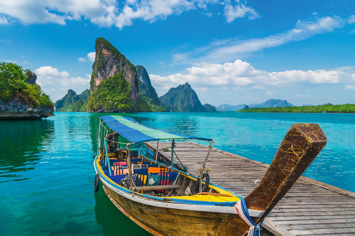 Beautiful nature scenic landscape Phang-Nga bay with wooden boat