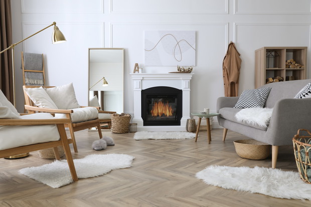 Beautiful living room interior with fireplace and armchairs