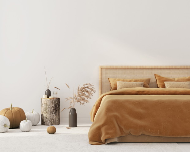 Bedroom interior  with autumn colored bedding  and decoration fo