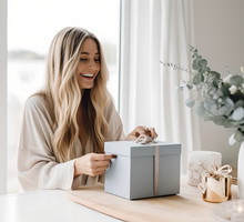Stylish scandinavian woman happy opening present gift box, Relax, carefree, comfort lifestyle, lazy day at home