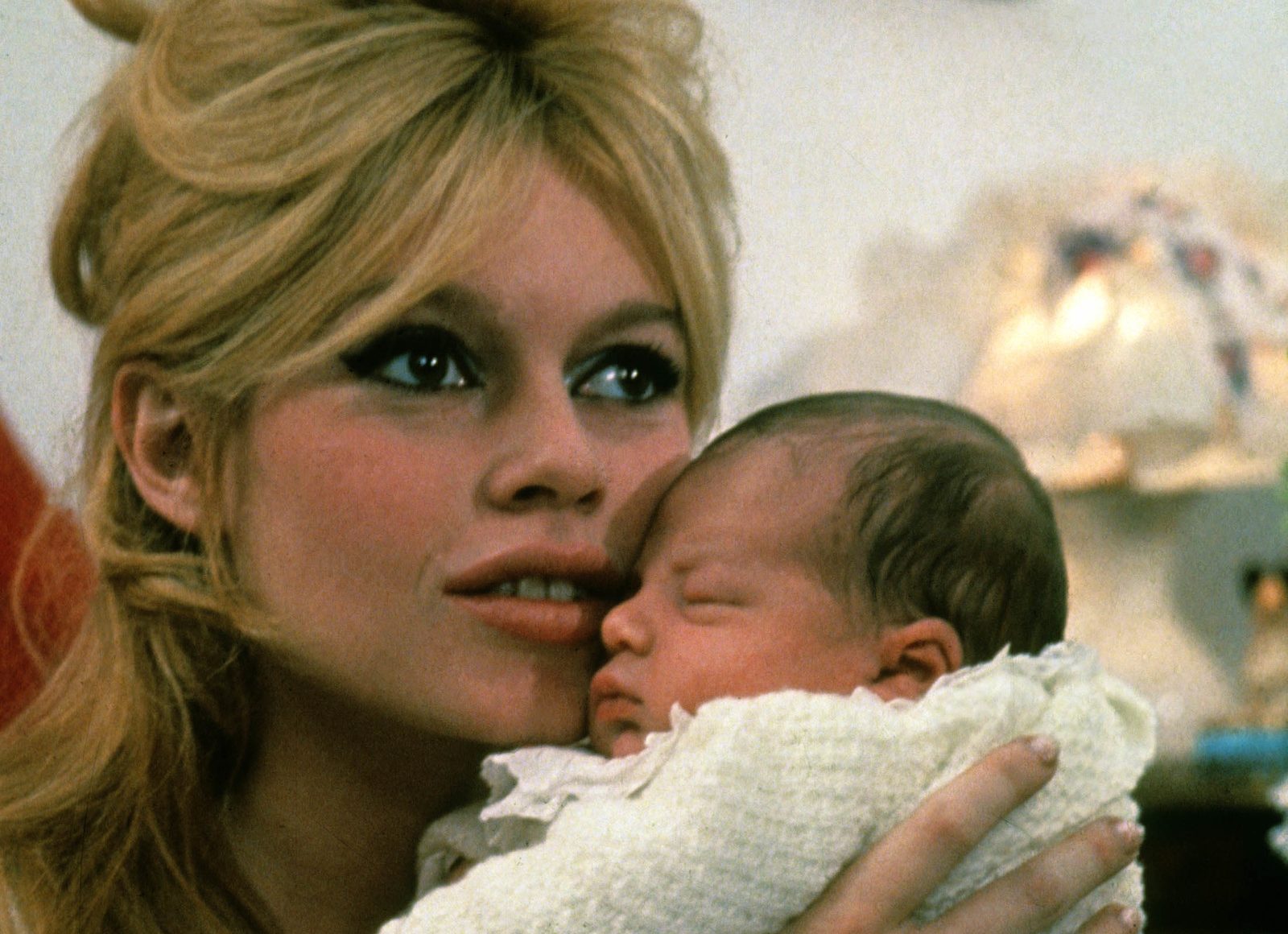 Brigitte Bardot presented her son Nicolas Charrier in exclusivity to two photographer of press in january 1960