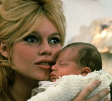 Brigitte Bardot presented her son Nicolas Charrier in exclusivity to two photographer of press in january 1960