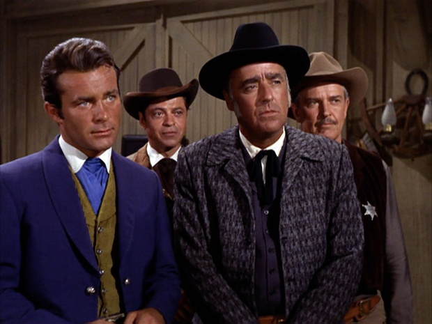 Robert Conrad jako James T. West, Ross Martin jako Artemus Gordon, Peter Lawford jako Carl Jackson i Alan Baxter jako  Sheriff Ned Briggs, 1966 rok, serial The Wild Wild West