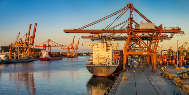 Container port in the rays of the setting sun. Gdynia, Poland