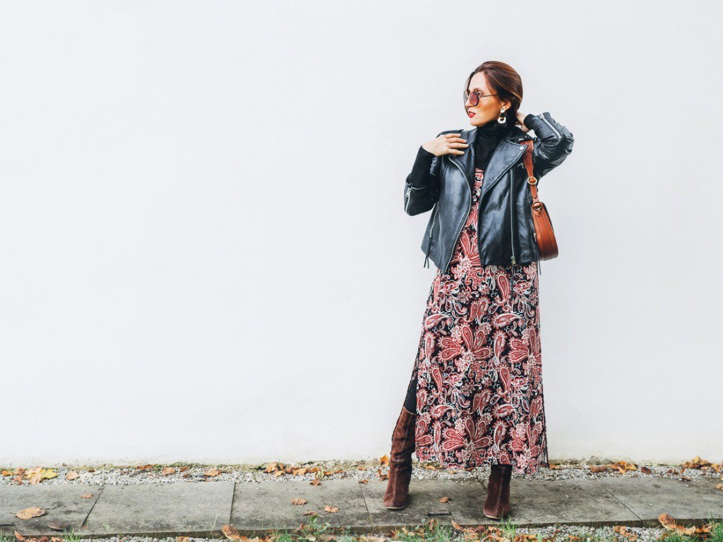 smiling-female-dressed-boho-fashion-style-colorful-long-dress-with-picture-id1178855373