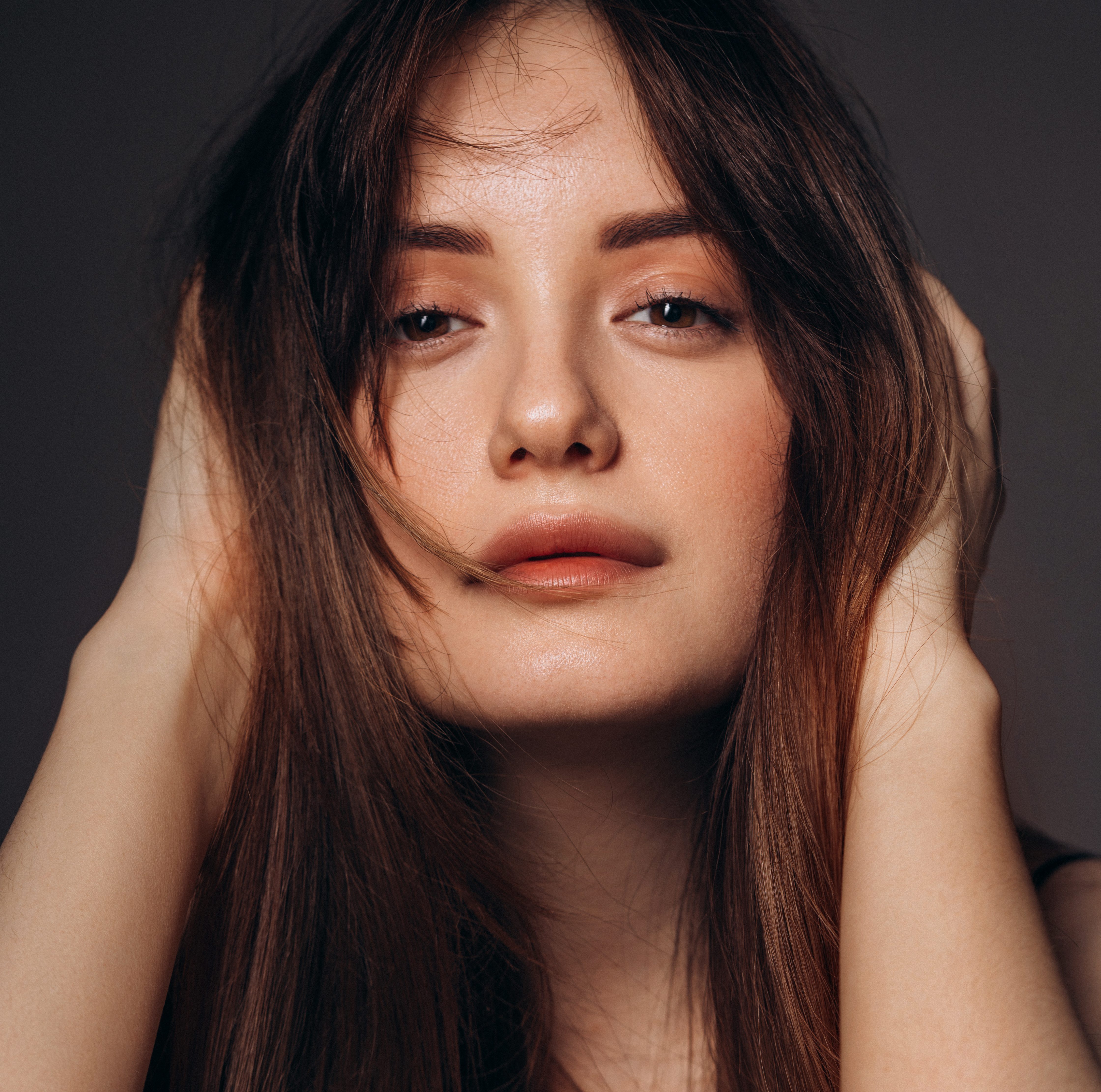 Beautiful emotional woman with natural make-up