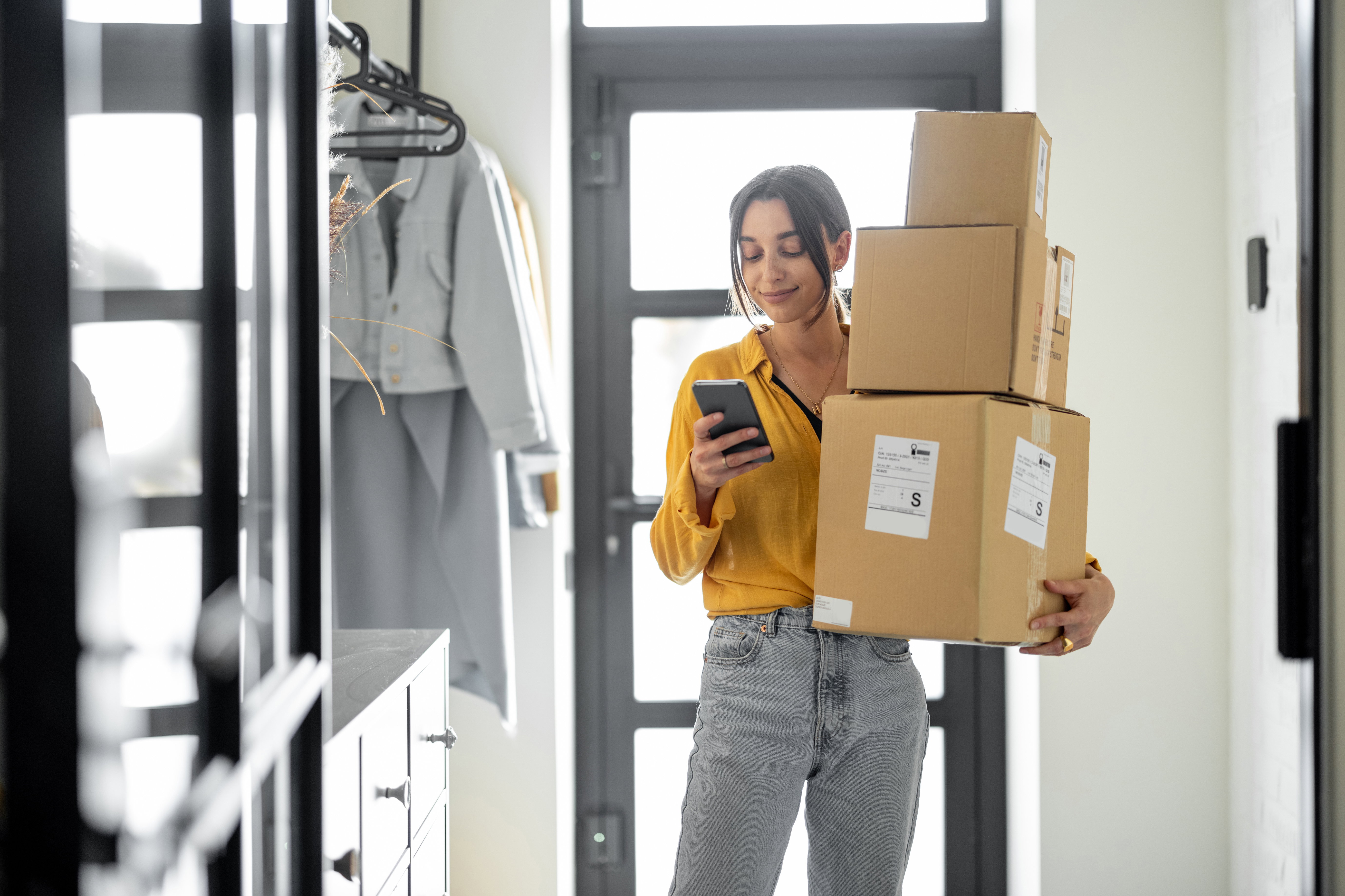 Woman comes home with a parcels