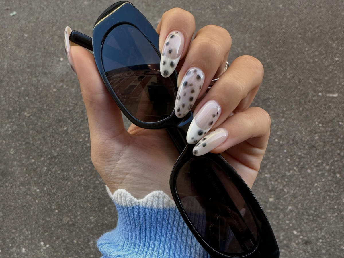 Milky dalmatian nails.